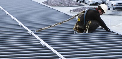 3M Permanent Horizontal Lifeline in use on rigid rail system
