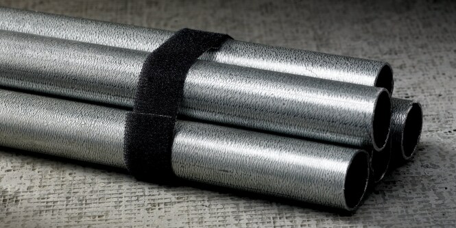 Image of back-to-back 3M™ Hook and Loop strapped around pieces of conduit
