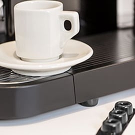 Imagen de tope adhesivos antideslizante en máquina de café