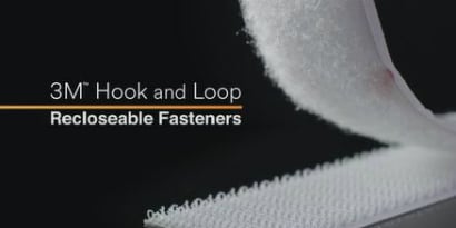 Video still of a partly separated strip with the title 3M™ Hook and Loop Reclosable Fasteners  
